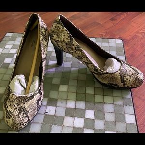 Brand new never worn Clark’s snake print pumps